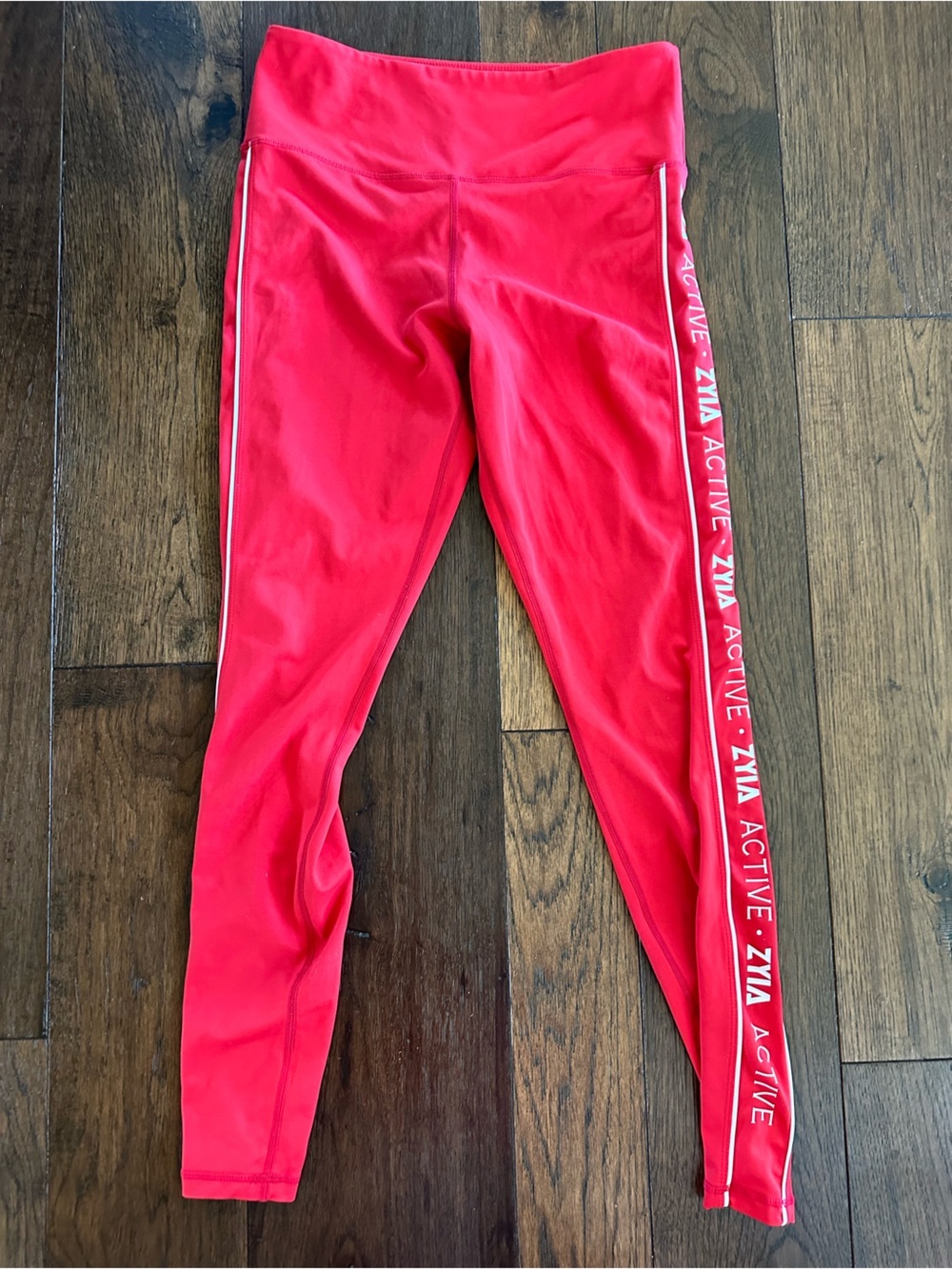 ZYIA Women’s Hot Red Active Leggings with Side Logo Stripe- size Medium (8/10)